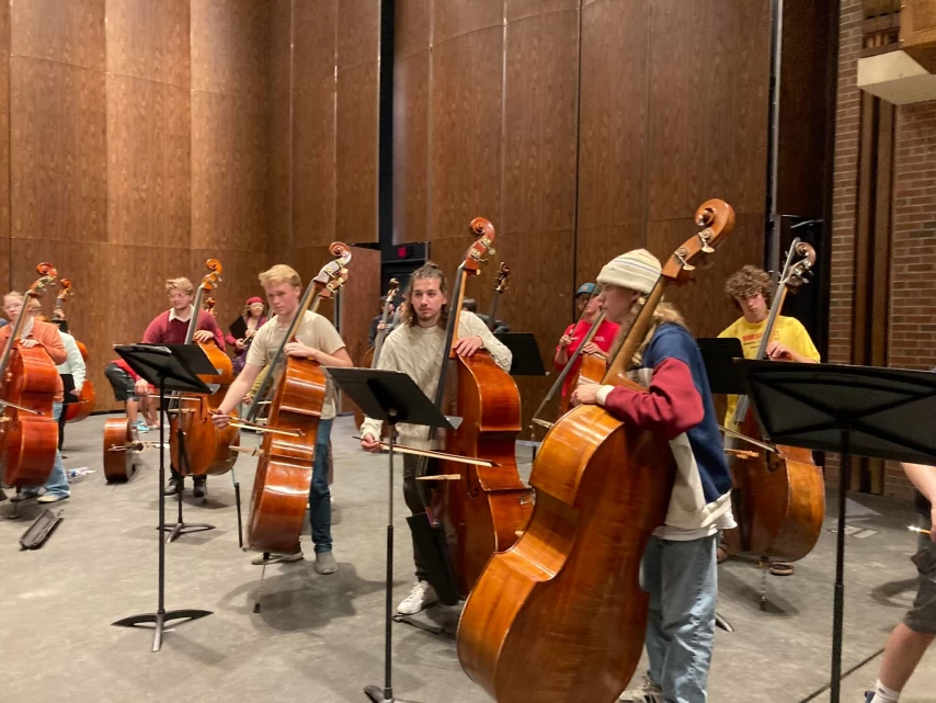 Musicians performing together at a local concert